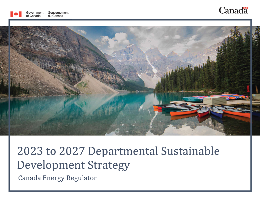 Cover showing mountains, canoes and lake
