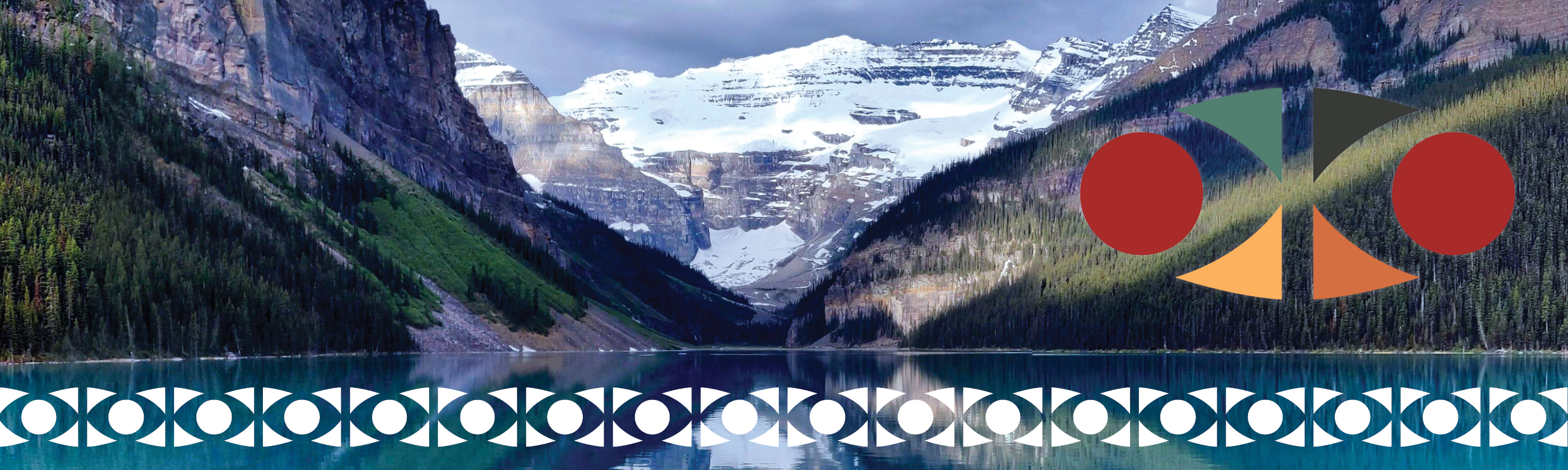Mountain near a body of water during daytime at Lake Louise in Banff National Park, with a transparent IAC logo imposed on top.