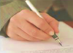 Hand holding pen