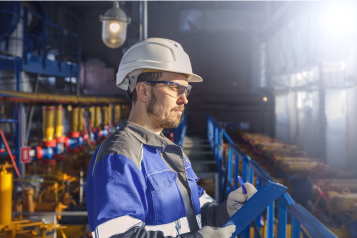 Energy Worker wearing safety equipment conditioning equipment and valve armature