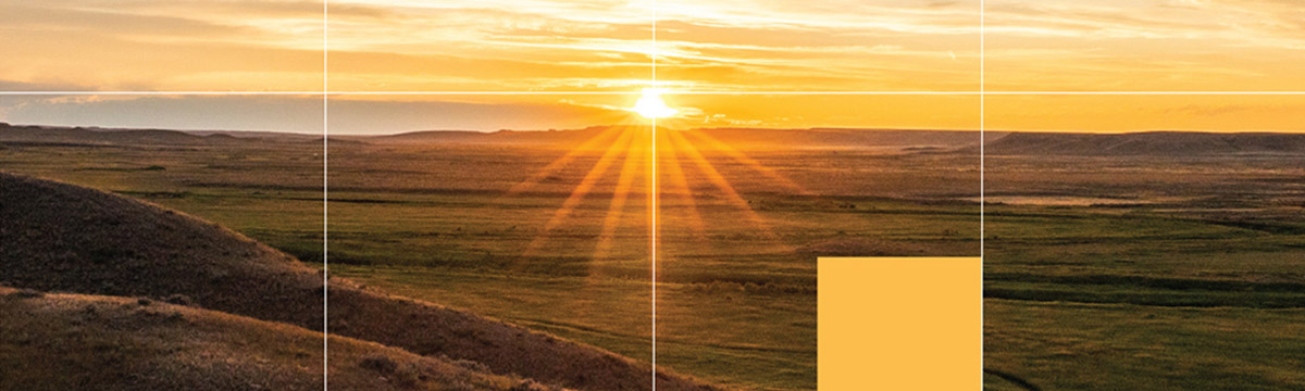 Sunset rising from hills